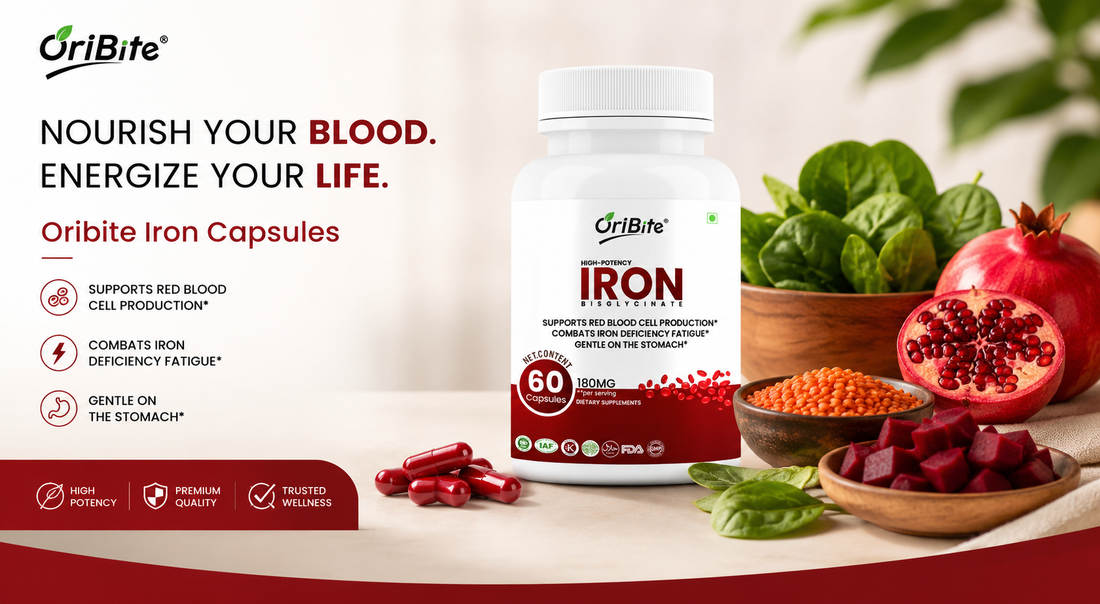 "Oribite Iron Capsules bottle next to a fresh pomegranate, sliced beetroot, and a bowl of lentils on a rustic wooden table."