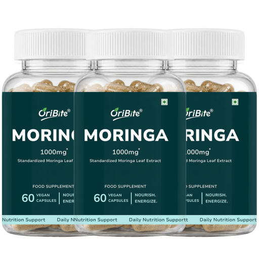Three clear plastic bottles of OriBite Moringa 1000mg food supplement capsules, arranged side by side against a white background.