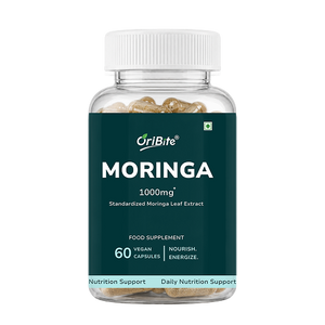 A bottle of OriBite Moringa 1000mg food supplement capsules, featuring a dark green label and a white cap, shown on a solid white background.