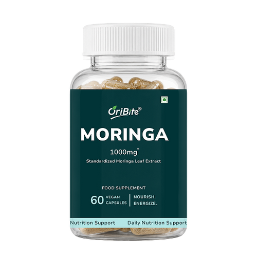 A bottle of OriBite Moringa 1000mg food supplement capsules, featuring a dark green label and a white cap, shown on a solid white background.